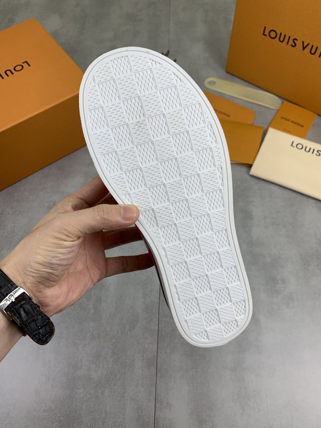 Louis Vuitton Red Embossed Low-Top Sneakers — detail