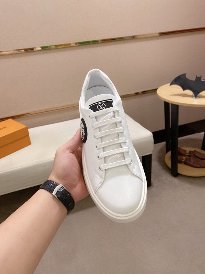 Louis Vuitton Emblem Low-Top Sneakers — front