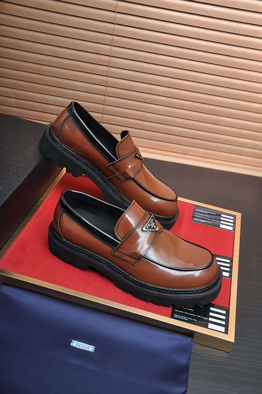 Prada Lug-Sole Strap Loafers — front