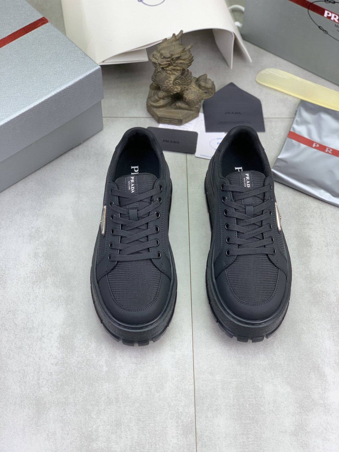 Prada Paneled Lug-Sole Sneakers — front
